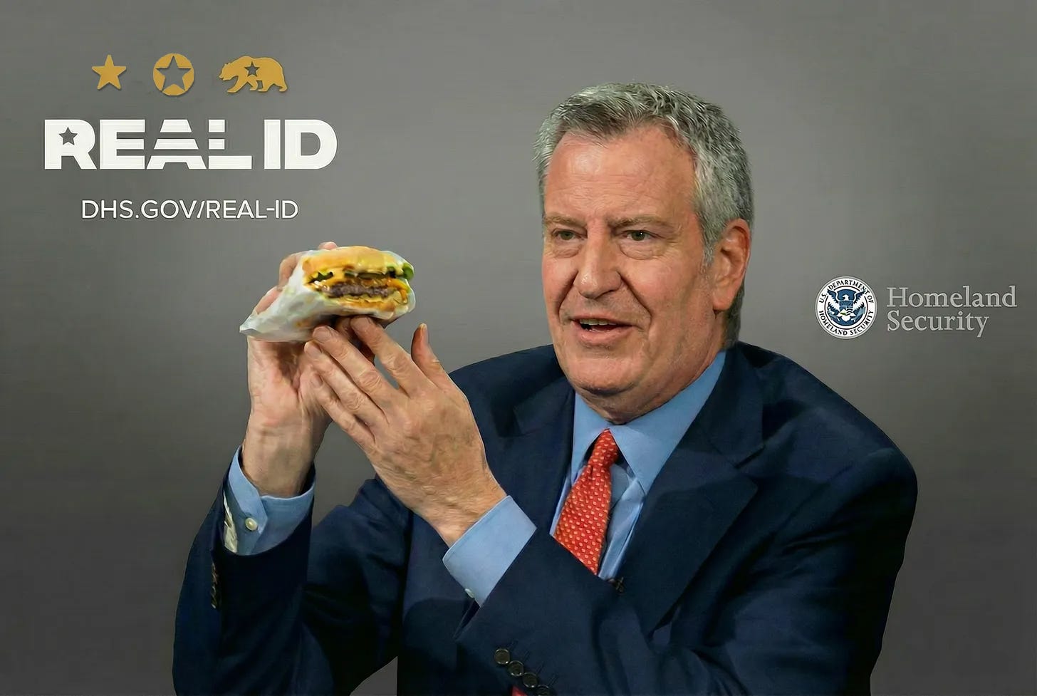 Bill de Blasio in a suit holding up a McDonald’s hamburger, with a REAL ID graphic displayed in the corner. Bill de Blasio in a suit holding up a McDonald’s hamburger, with a REAL ID graphic displayed in the corner.