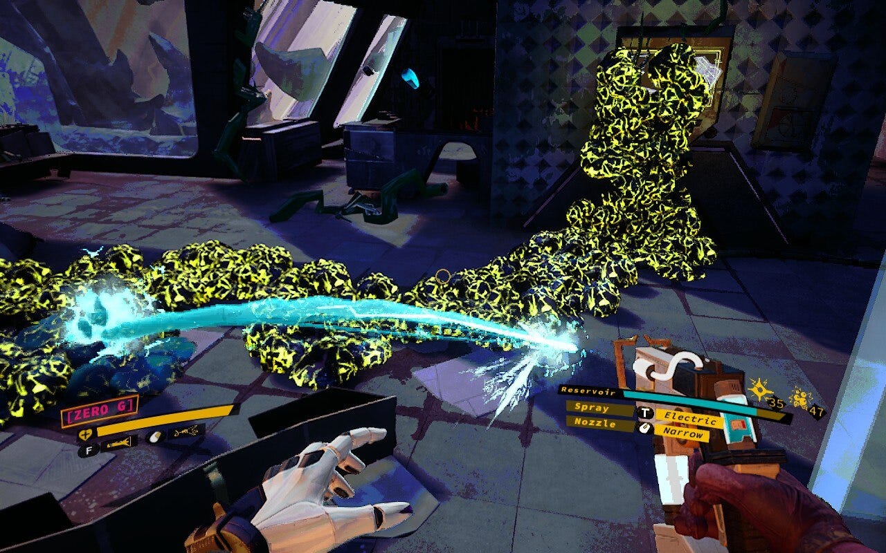 Video game screenshot showing the first-person perspective of a person spraying foam onto the ground. A ridge of that foam crackles with electricity. Video game screenshot showing the first-person perspective of a person spraying foam onto the ground. A ridge of that foam crackles with electricity.
