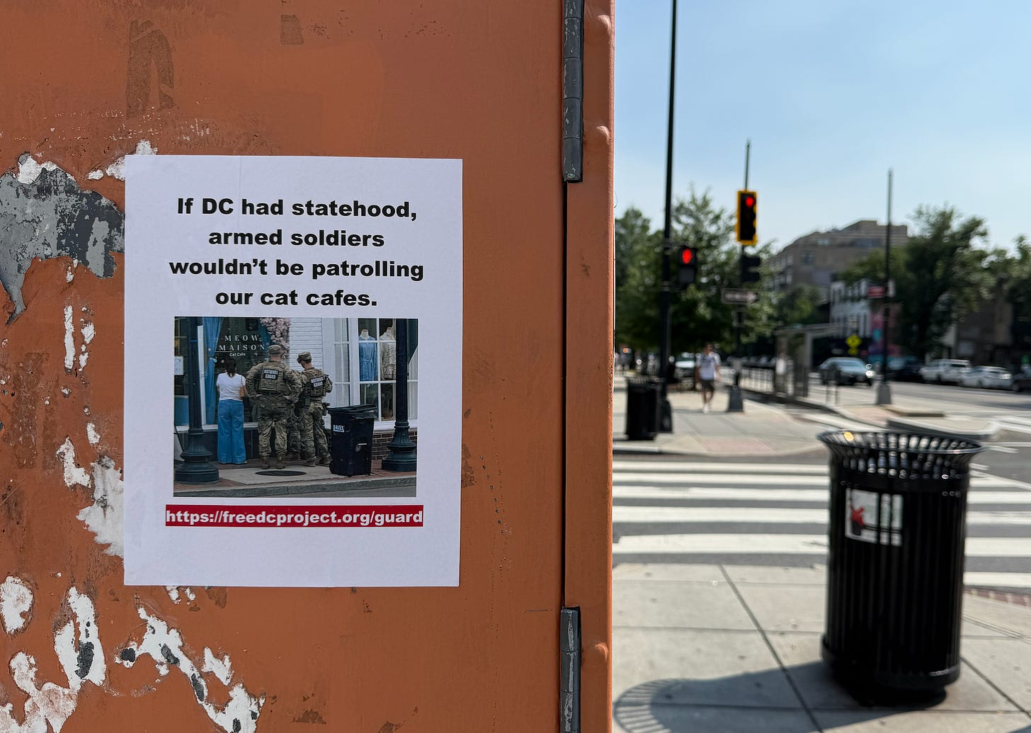 A sign posted that says: If DC had statehood, armed soldiers wouldn't be patrolling our cat cafes. https://freedcproject.org/guard A sign posted that says: If DC had statehood, armed soldiers wouldn't be patrolling our cat cafes. https://freedcproject.org/guard