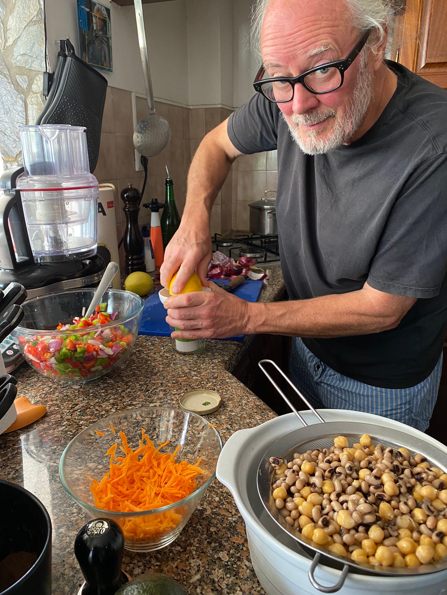 Simon Campbell making a mixed bean salad in the Supertone kitchen in Samora Correia Portugal.