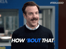 a man with a mustache says how bout that in blue a man with a mustache says how bout that in blue