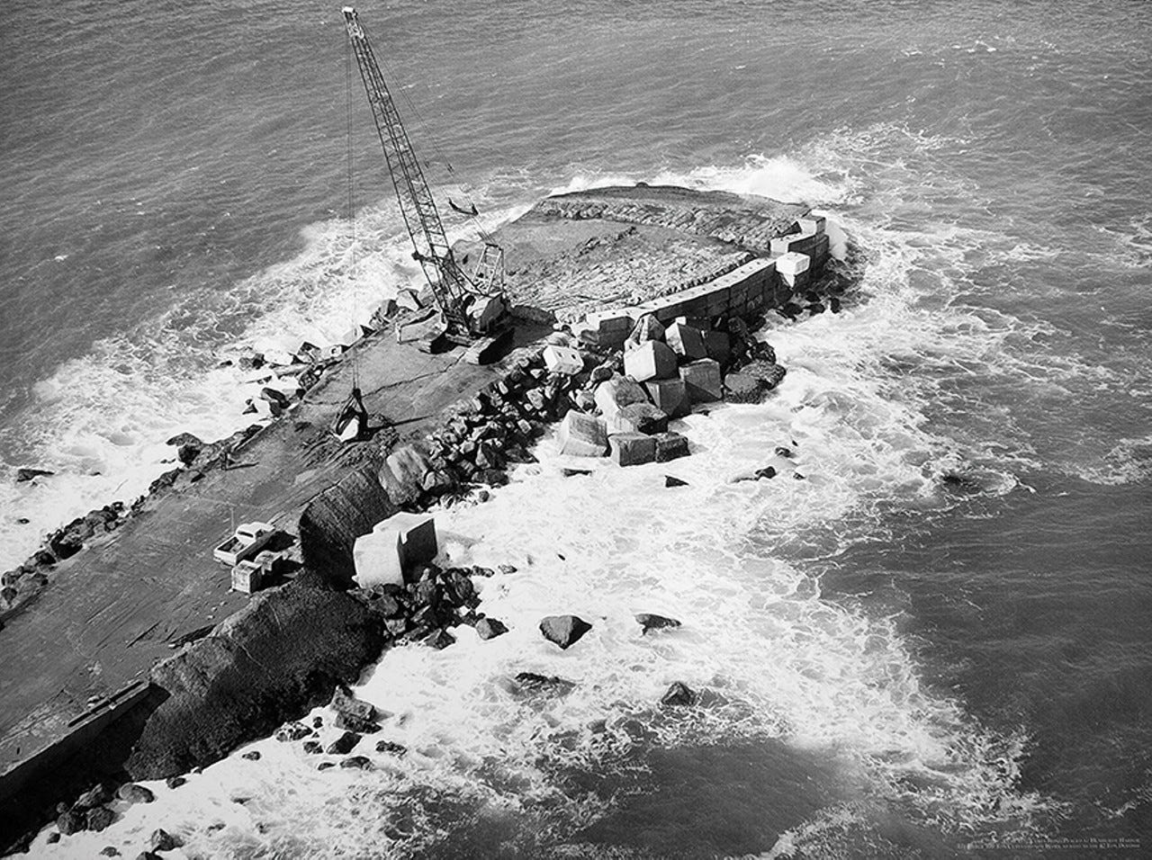 PHOTO COURTESY OF THE U.S. ARMY CORPS OF ENGINEERS - In the early 1960s, the U.S. Army Corps of Engineers placed 100-ton blocks on the south jetty. They washed away within five years. PHOTO COURTESY OF THE U.S. ARMY CORPS OF ENGINEERS - In the early 1960s, the U.S. Army Corps of Engineers placed 100-ton blocks on the south jetty. They washed away within five years.