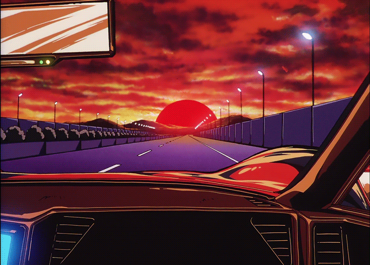 This may contain: an image of a car driving down the road at sunset or sunrise with red and orange clouds
