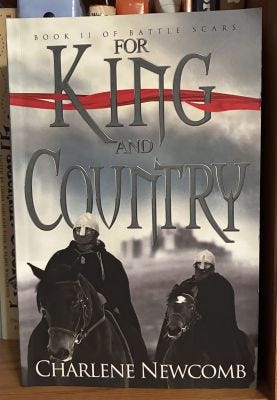 The book cover for Charlene Newcomb's book For King and Country with two knights on horseback and a flying red banner.