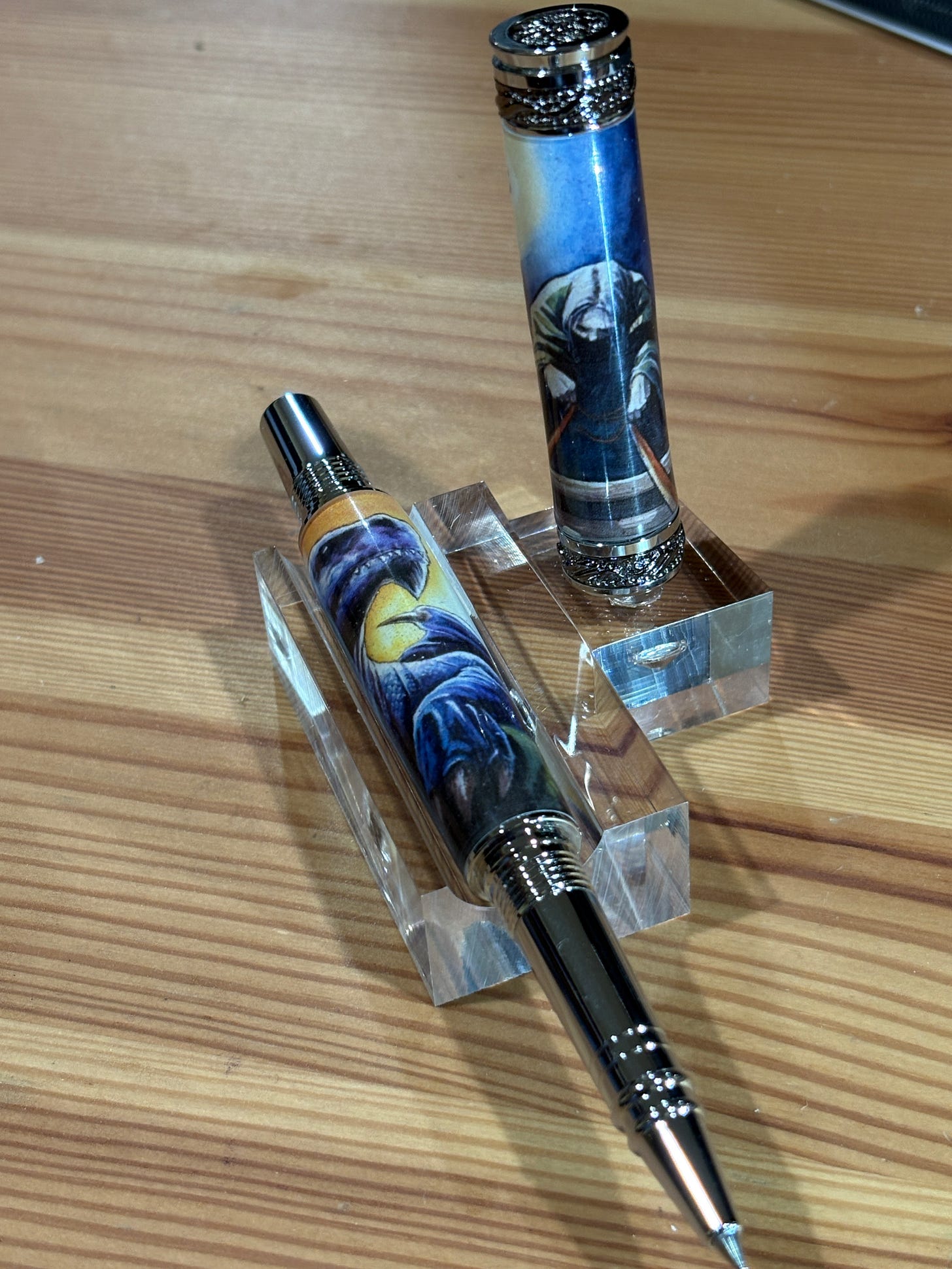 A gel pen created by the author, with artwork from his books, Mace & Sword, and The Druid. Art by Matt Slay