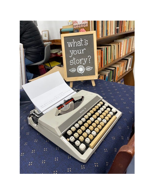 A typewriter on a chair

Description automatically generated