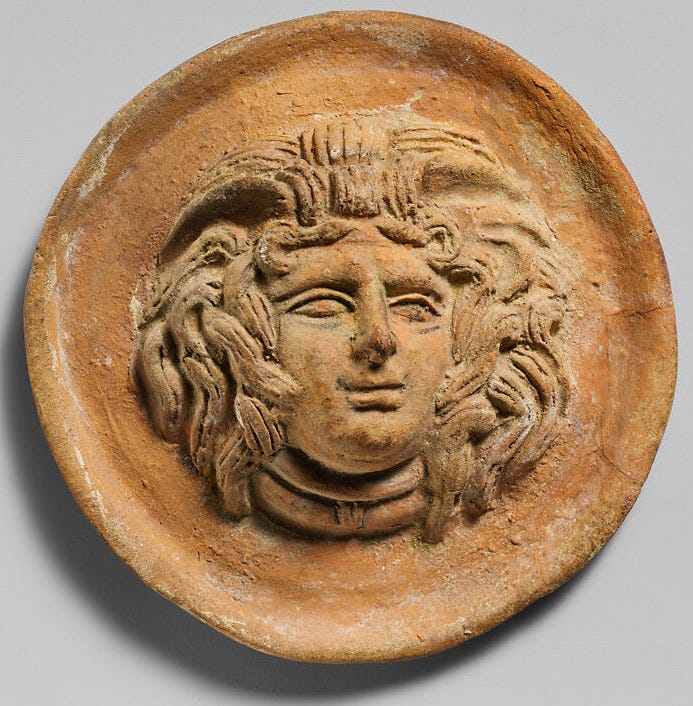 Terracotta reilef roundel with head of Medusa, Terracotta, Greek 