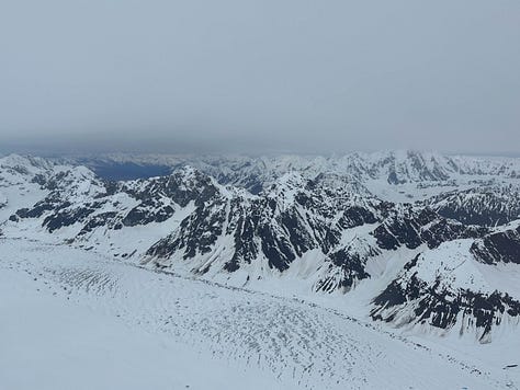 Three views of mountains near Denali from Talkeetna Air Taxi plane.