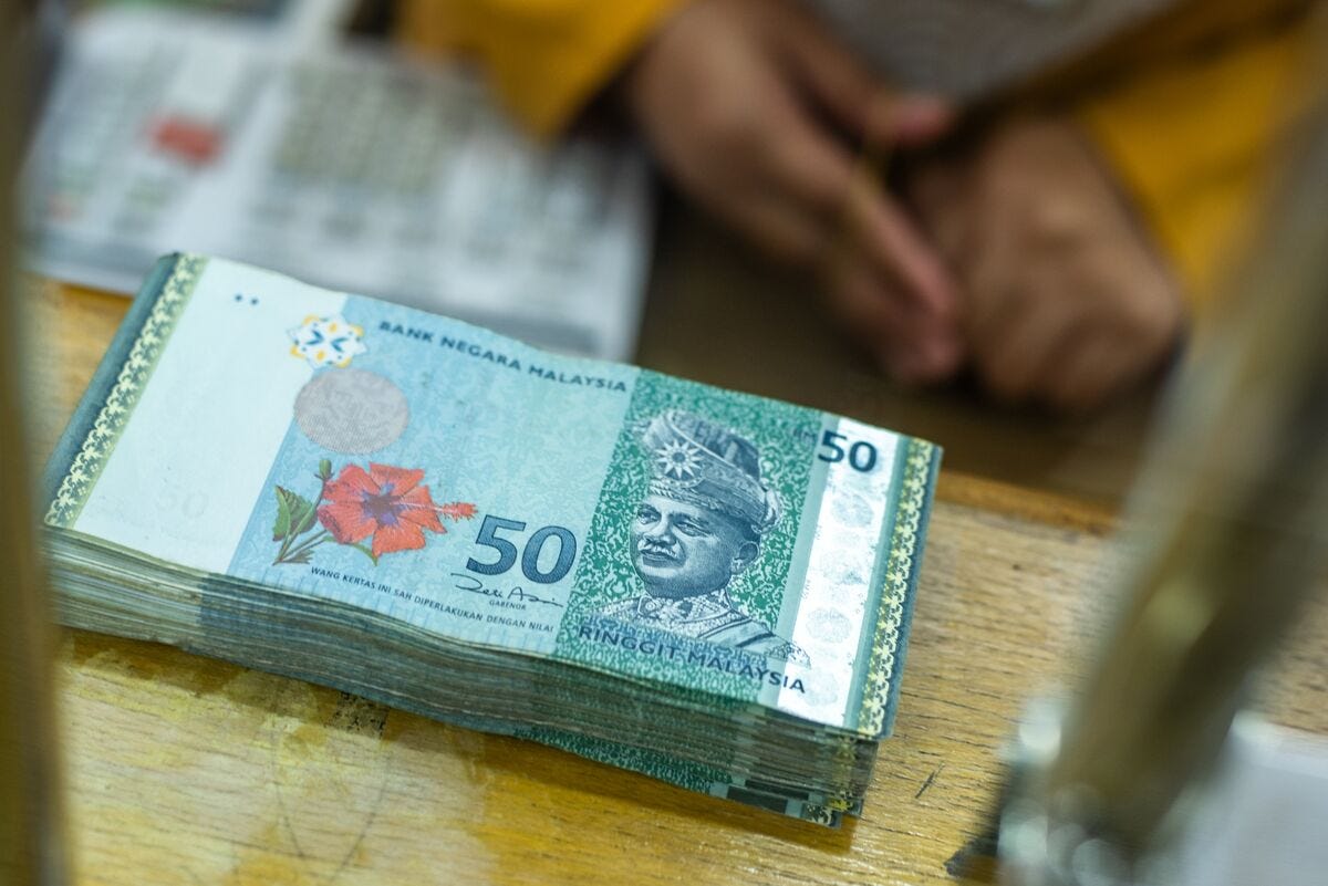 Ringgit Rises to 2018 High Buoyed by Trump, Central Bank Comments