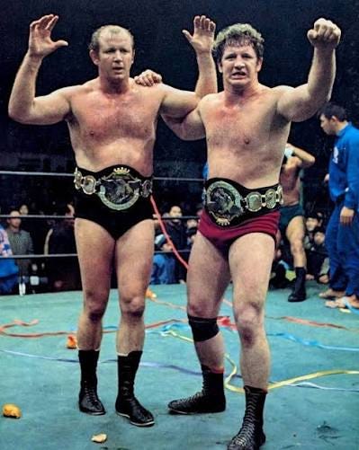 Terry and Dory Funk with the WWC Puerto Rico World Tag Team Championships