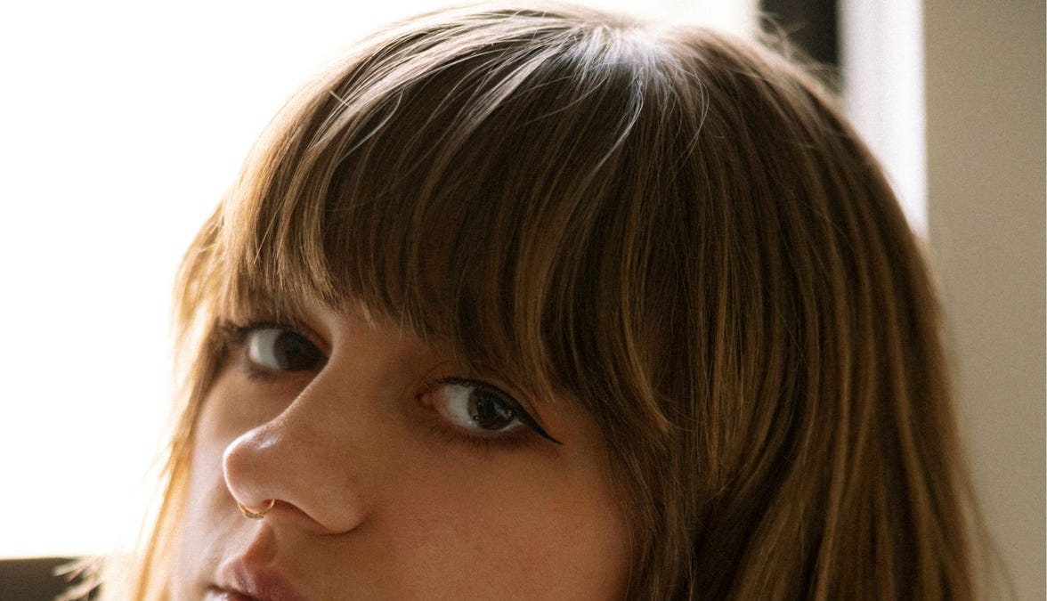 Emily Rose Burnett Delivers Sister Songs 