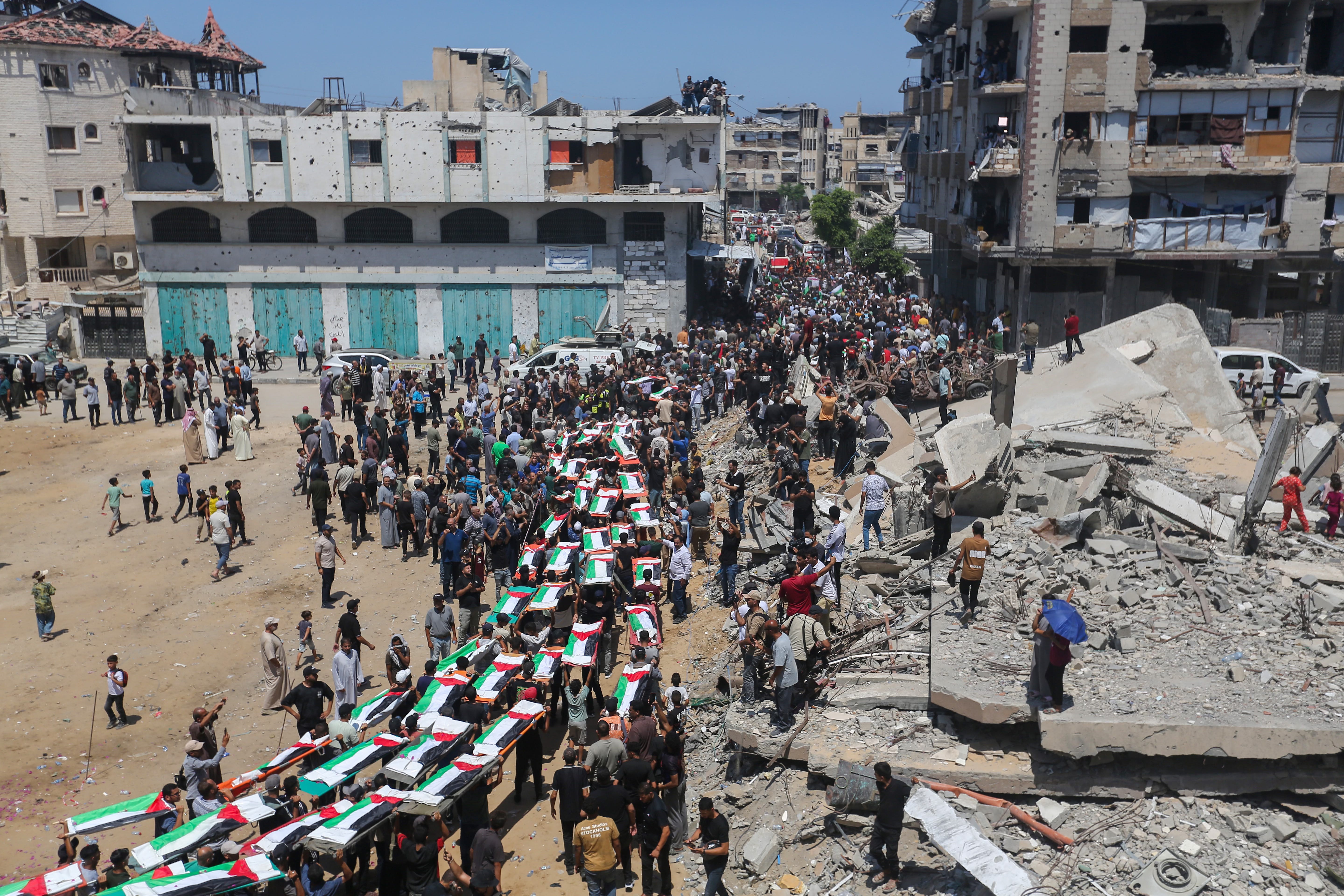 U.S. seeks public input on Iran policy as Gaza marks mass funeral