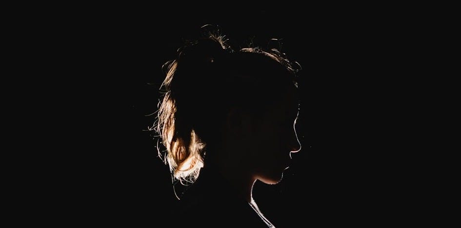 a black silhouette of a woman