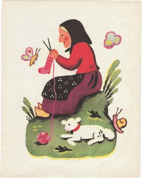This may contain: a woman sitting on top of a grass covered field next to a dog and butterfly