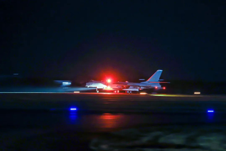A PLAAF H-6K bomber equipped with M-ALBMs undertake a nighttime training operation. A PLAAF H-6K bomber equipped with M-ALBMs undertake a nighttime training operation.