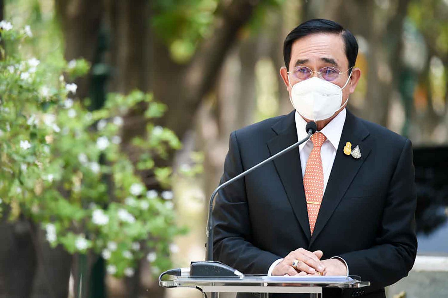 Prime Minister Prayut Chan-o-cha speaks to reporters at Government House in March 2022. (Photo: Government House)
