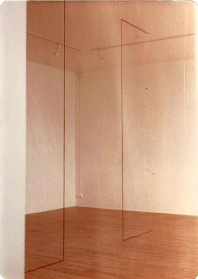 A Sandback sculpture installed in a room.
