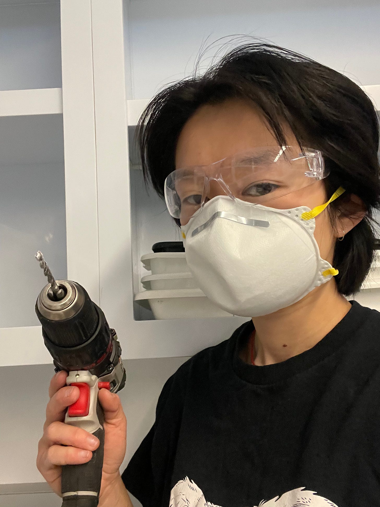 Drilling lots of holes in concrete while wearing proper PPE. Drilling lots of holes in concrete while wearing proper PPE.