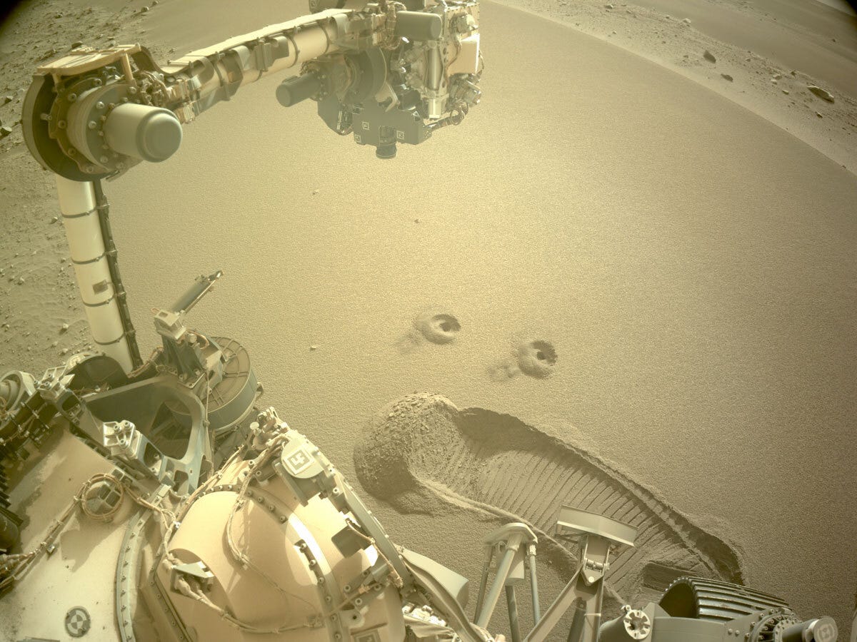 Perseverance’s First 2 Regolith Samples: Two holes are left in the Martian surface after NASA’s Perseverance rover used a specialized drill bit to collect the mission’s first samples of regolith – broken rock and dust – on Dec. 2 and 6. Credits: NASA/JPL-Caltech. Download image ›