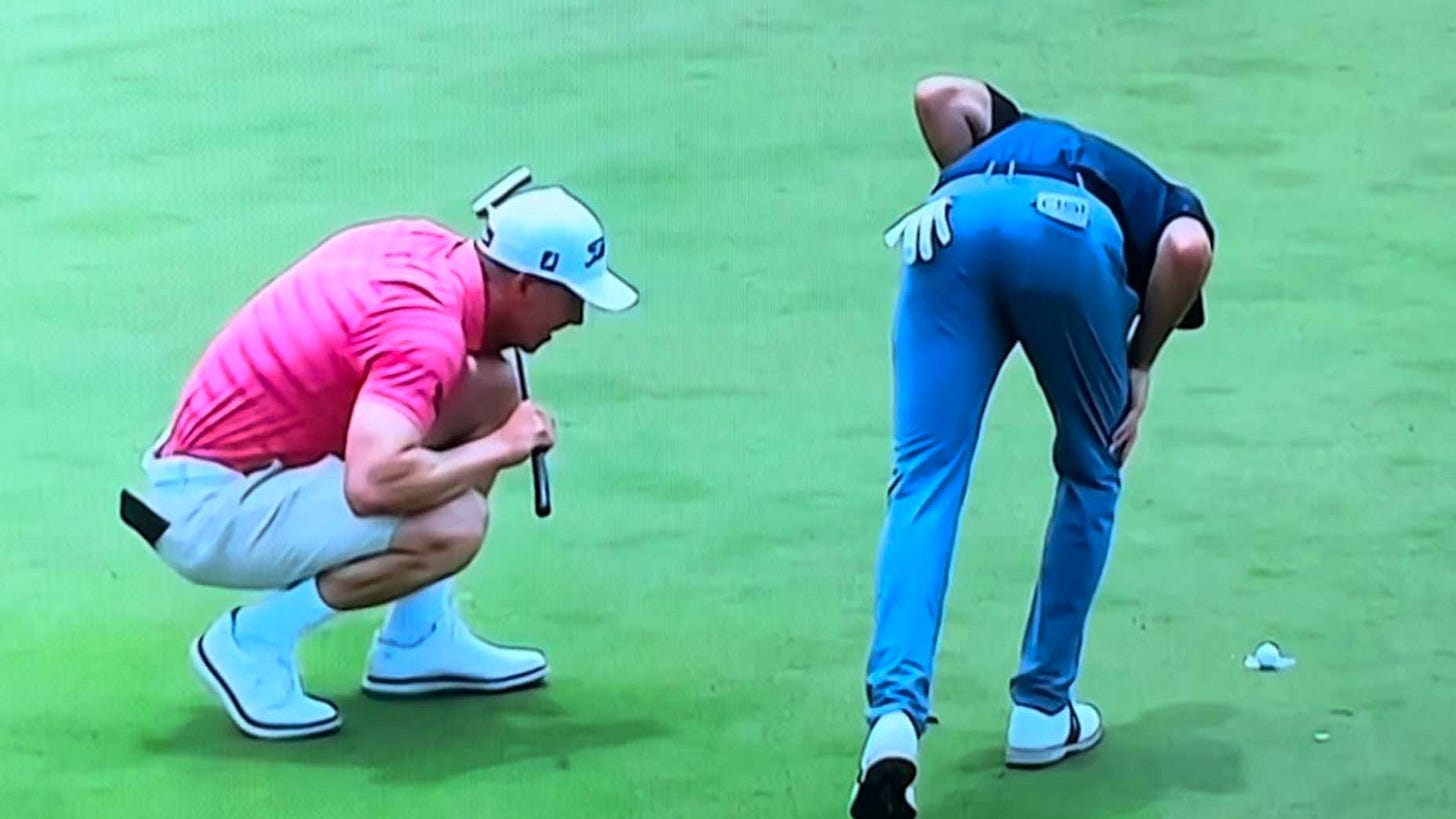 Pro's birdie putt hung on the lip for 1 minute, and the rules got confusing
