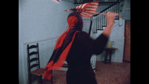 Woman dancing with a flag