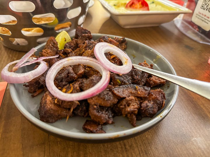 L-R: Beef Fry with a lime wedge and wheat porotta