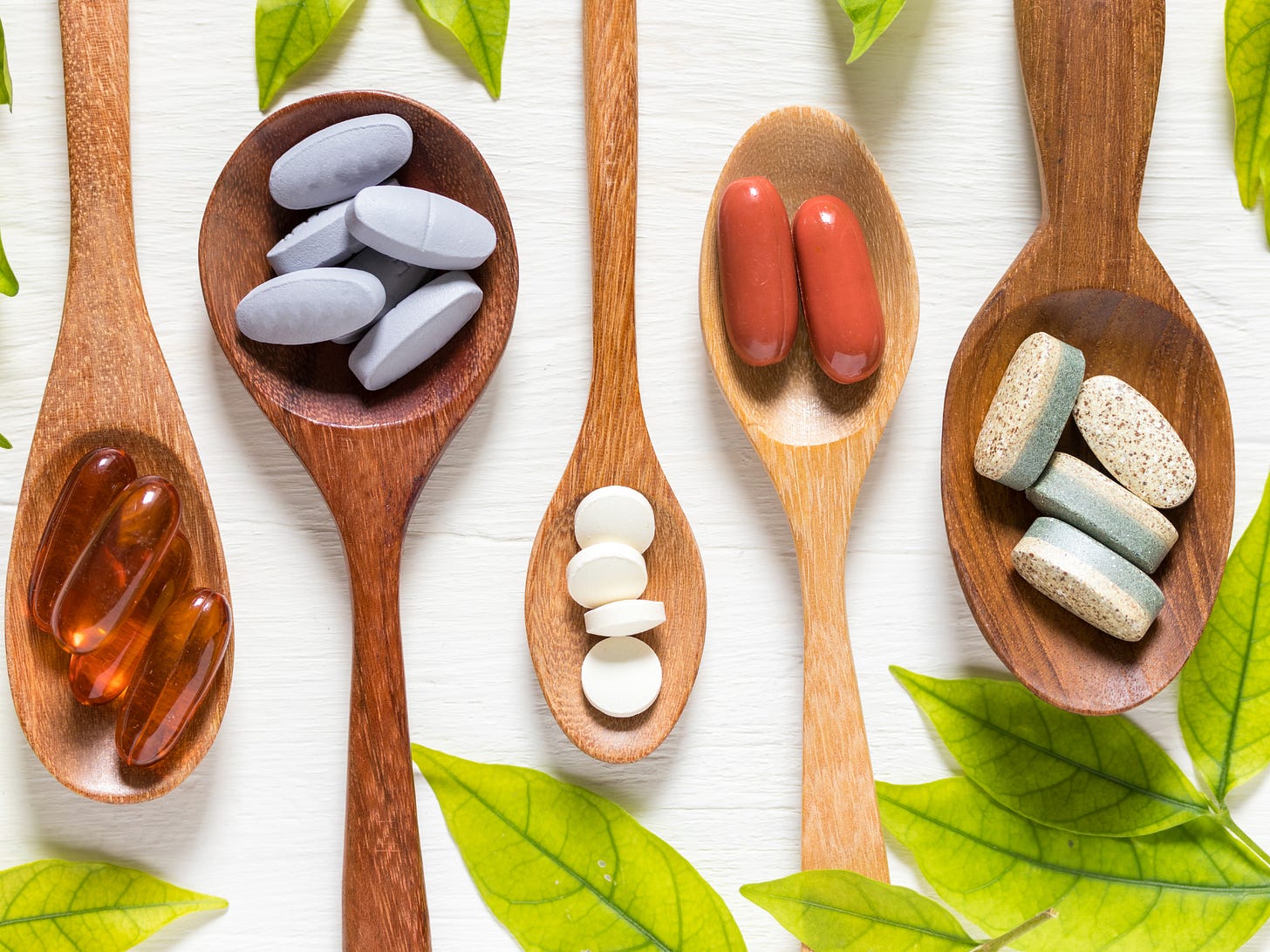 image of supplements on spoons