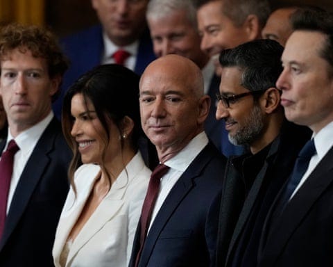 Mark Zuckerberg, Lauren Sanchez, Jeff Bezos, Sundar Pichai and Elon Musk standing in a row in formal gear.