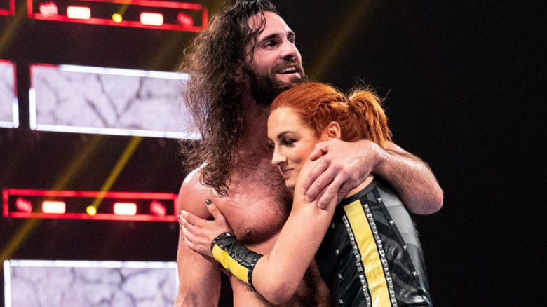Seth Rollins and Becky Lynch hugging