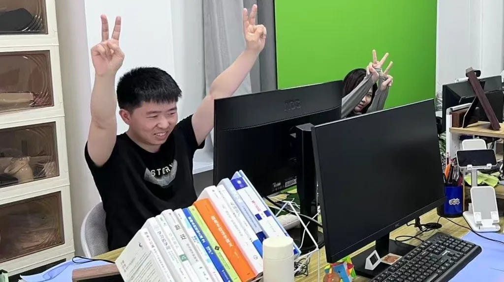 Shui Zhou pays to go into an office every day. Photo: BBC