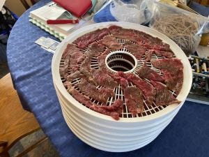 Jerky on the dehydrator on dehydrator