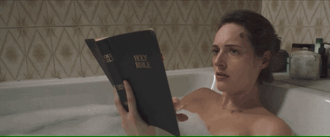 GIF of Fleabag reading the Bible in the bathtub. GIF of Fleabag reading the Bible in the bathtub.