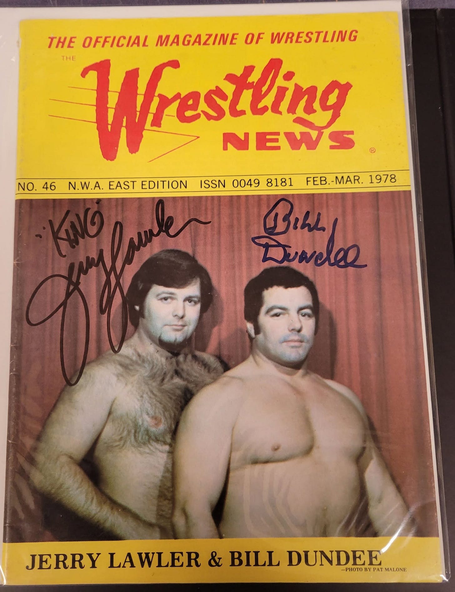 May be an image of text that says 'THE OFFICIAL MAGAZINE OF WRESTLING THE Wrestling NEWS NO.46 N.W.A. EAST EDITION ISSN 0049 8181 FEB.-MAR. 04NWA.EATEDIOAS1 FEB 1978 NO. 46 Bihl Duades JERRY LAWLER & BILL DUNDEE PHOTO PHOTOBYPAT PAT MALONE' May be an image of text that says 'THE OFFICIAL MAGAZINE OF WRESTLING THE Wrestling NEWS NO.46 N.W.A. EAST EDITION ISSN 0049 8181 FEB.-MAR. 04NWA.EATEDIOAS1 FEB 1978 NO. 46 Bihl Duades JERRY LAWLER & BILL DUNDEE PHOTO PHOTOBYPAT PAT MALONE'