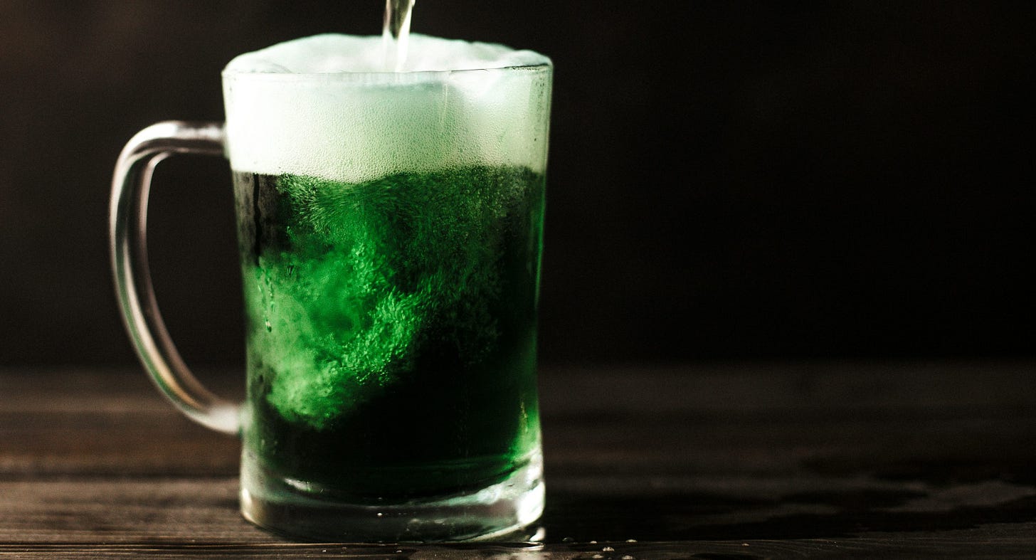 clear glass mug filled with green liquid clear glass mug filled with green liquid