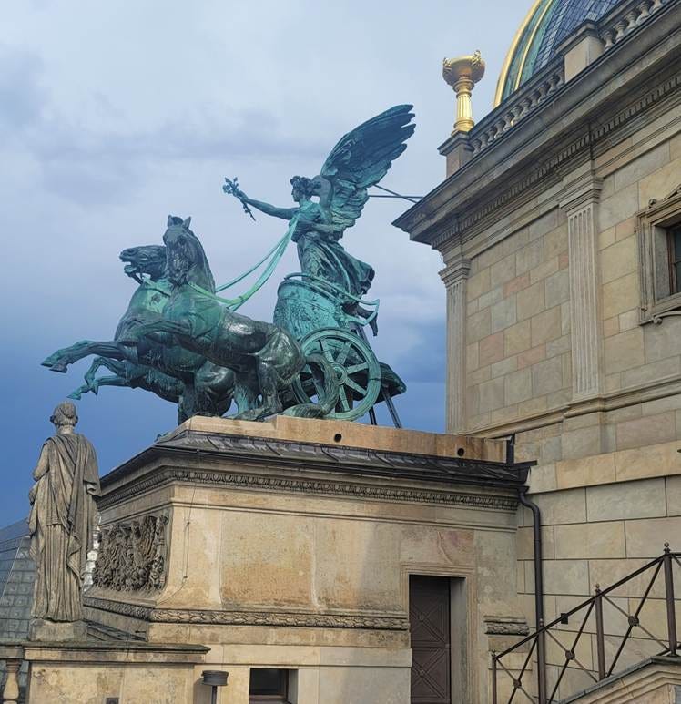 A statue of a person on a horse

AI-generated content may be incorrect.