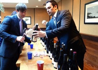 A - CDP - John Junguenet pours at tasting A - CDP - John Junguenet pours at tasting