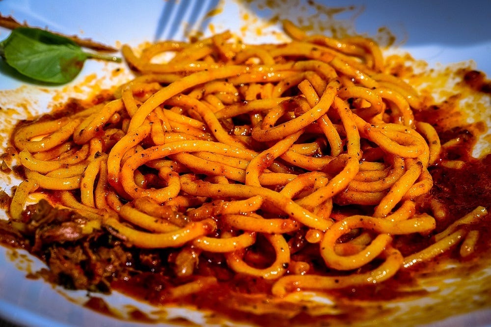 A bowl of spaghetti bolognese.