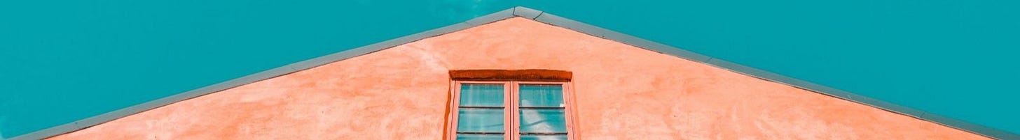 A window at the top of a building.