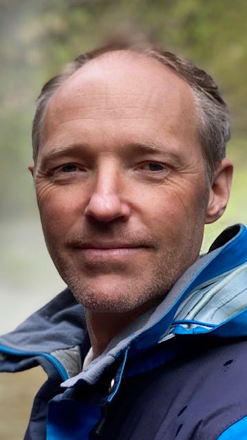 Portrait photo of Dr Jamie Hosking