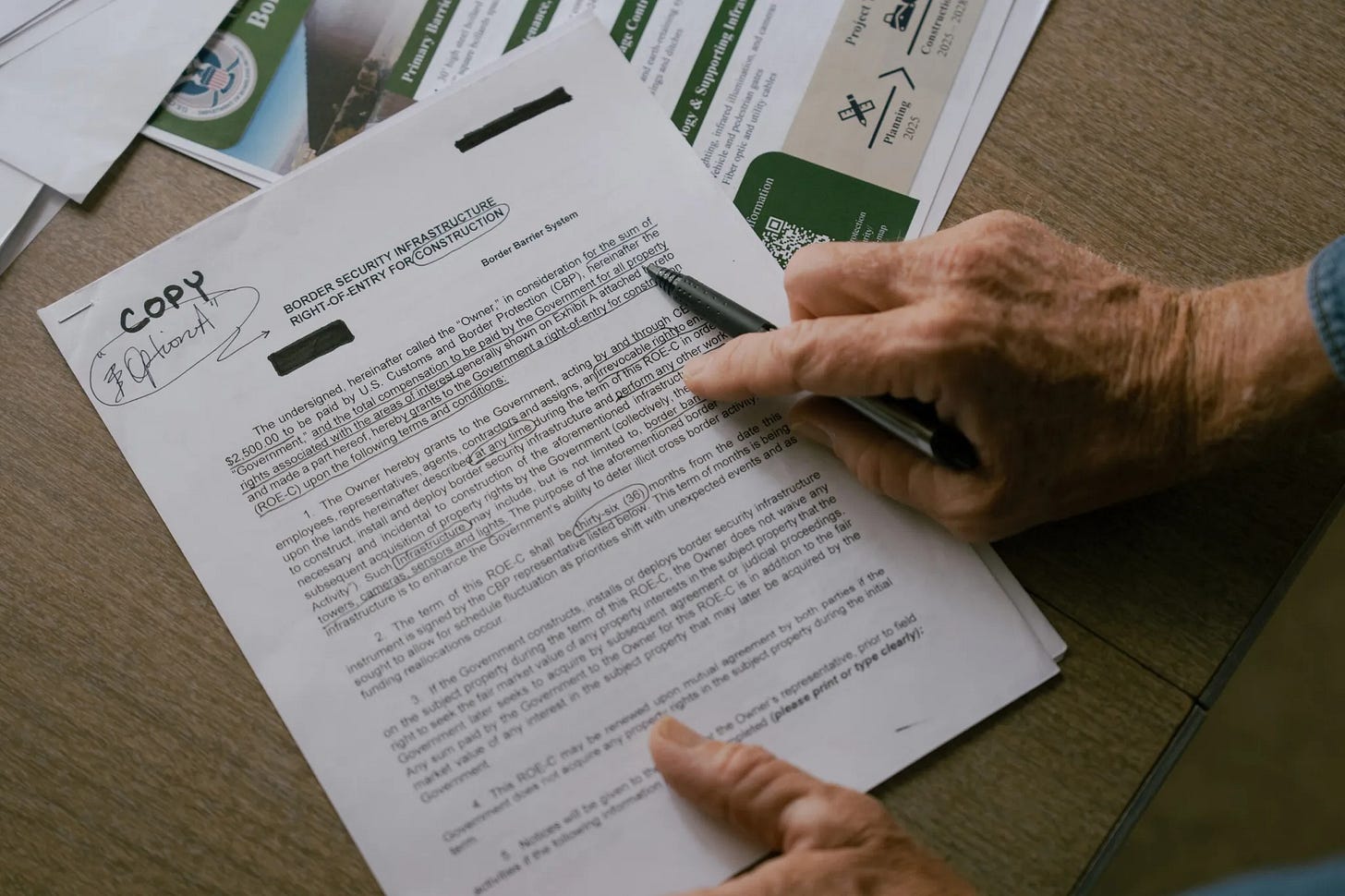Landowner David Keller, 55, shows a letter he received from Customs and Border Protection requesting access to his property for survey of border wall construction in Redford, Texas, on June 4, 2026. (Photo by Paul Ratje for The Texas Tribune) Landowner David Keller, 55, shows a letter he received from Customs and Border Protection requesting access to his property for survey of border wall construction in Redford, Texas, on June 4, 2026. (Photo by Paul Ratje for The Texas Tribune)