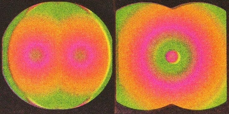 This may contain: four different colored circles are shown in the same color as each other on a black background