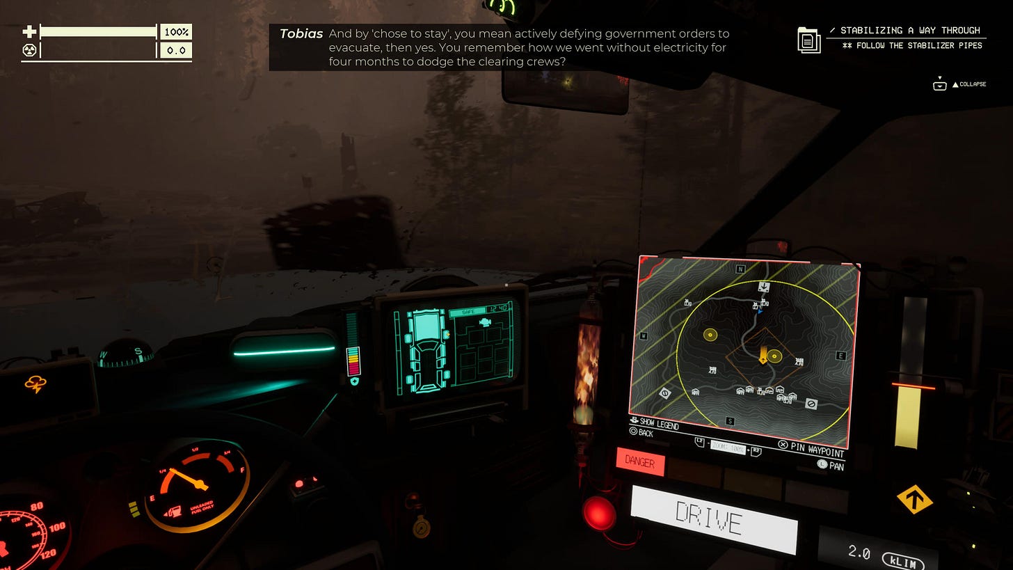Interior of a car, looking at a GPS screen. The outside is very dark.