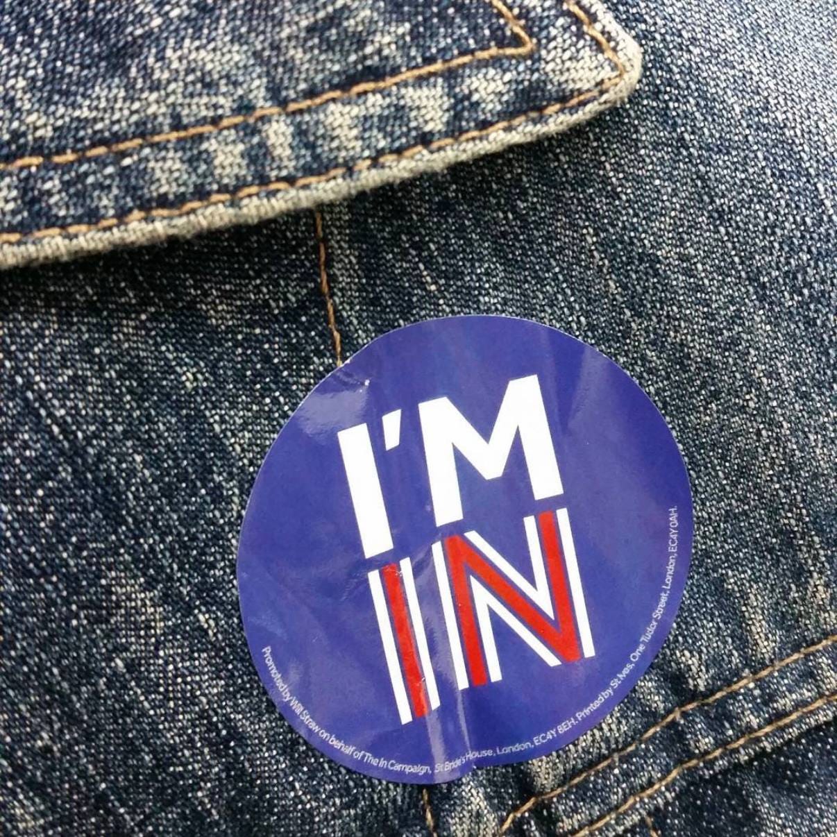 Image of a Remain campaign sticker, with the text "I'M IN", stuck on a denim jacket. Photo taken by Lori Topper.