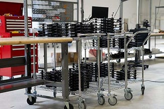 Stacks of Neros Archer drones awaiting shipment image