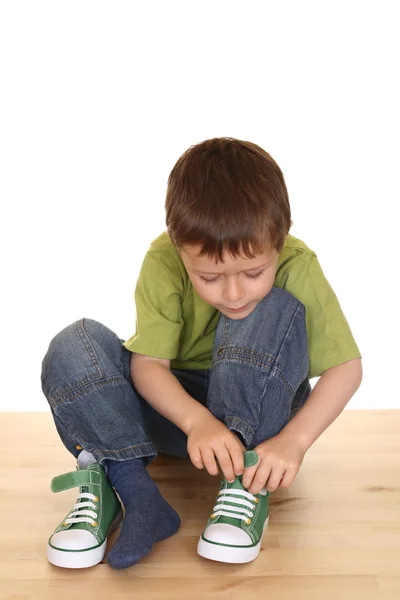 Kid tying shoe Stock Photos, Royalty Free Kid tying shoe Images |  Depositphotos