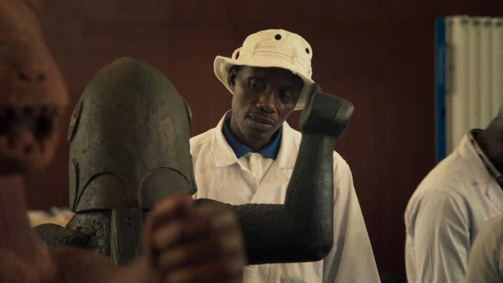 A still from "Dahomey", Mati Diop's documentary about the return of looted artefacts from France to modern-day Benin. A still from "Dahomey", Mati Diop's documentary about the return of looted artefacts from France to modern-day Benin.