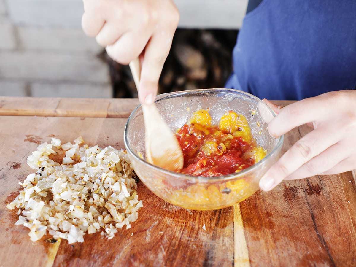 Stirring Grilled Tomato Salsa Stirring Grilled Tomato Salsa