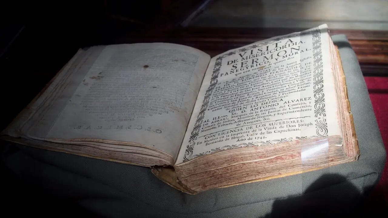 Puebla walking tour - a pedestrianised street with colourful buildings on either side