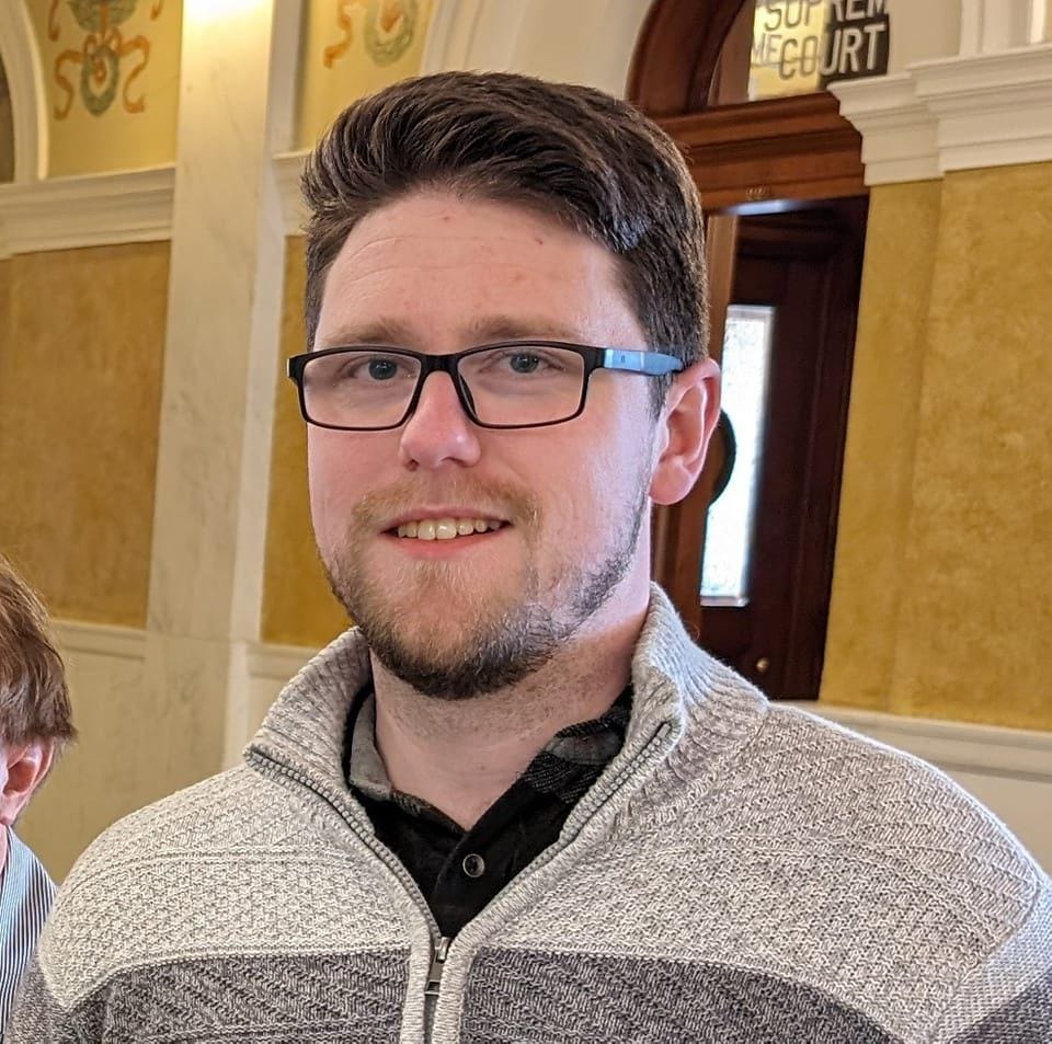 May be an image of 1 person and text