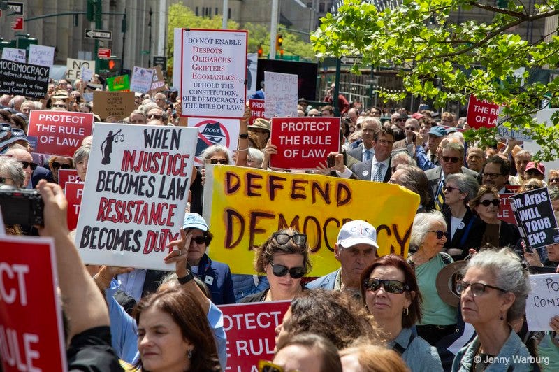 May be an image of crowd and text that says '오0밥 ケン OCREMOCRACY DO NOT ENABLE DESPOTS OLIGARCHS ANIP EGOMANIACS UPHOLDTHE CONSTITUTION, OUR DEMOCRACY THE RULEO LAW PROT THE DOGE PROTECT THE RULE f INJUSTICE OF LAW WHEN BECOMES LAW RESISTANCE BECOMESDUTY BECOME DUTY THE RU OFLA OF PROTECT THE RULE OFLAW- OF LAW DEFEND CT ML,ArDs Bn, Arps LE WILL YOUR EN? OTECT RUL P COM © ©JennyWarburg Jenny Warburg Warb'